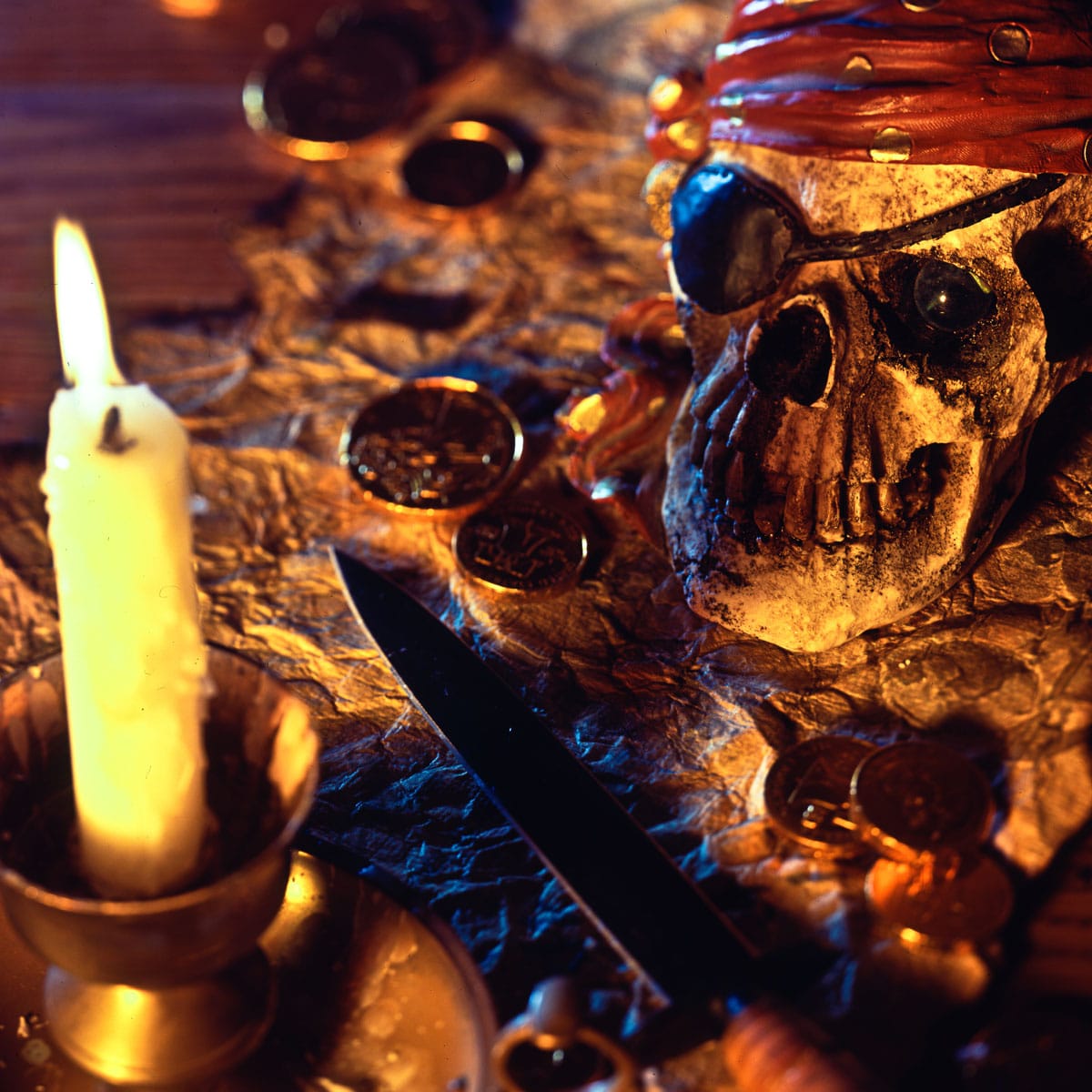 Aged Miniature Skull Gothic Candlestick Holder on A Rustic